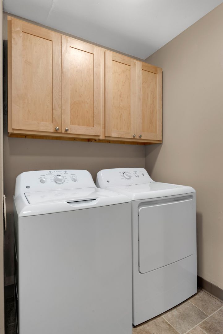 Laundry room at Alpine Apartments