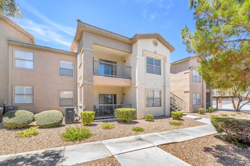 Top-Floor End Unit with Dual Primary Suites in a Gated Southwest Community! – photo 1
