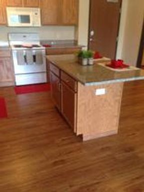Pet Friendly 2 Bedroom Apartment Vaulted Ceiling and Top Floor; comes with washer/dryer and a double stall garage – photo 1