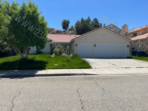UPGRADED 3BD/2BTH EAST PALMDALE HOME w/Solar – photo 1