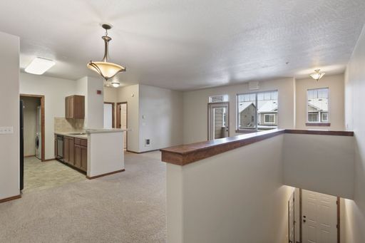 The Tamarack - Attached Garage and Stairway Entry – photo 1