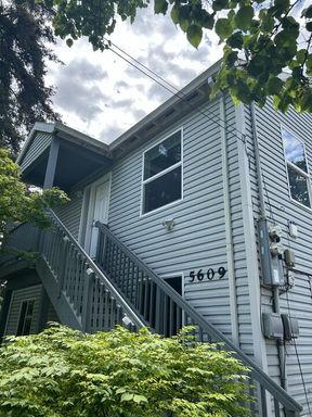 Spacious SE Portland duplex home with garage parking & shared backyard! – photo 1