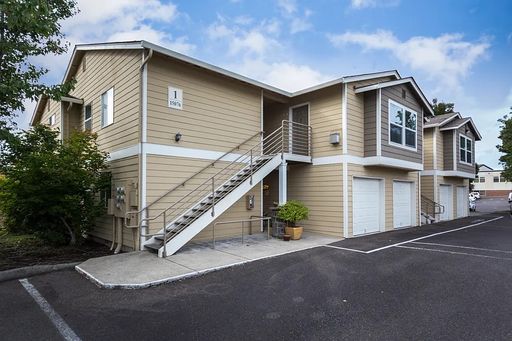 Step into comfort at 15076 NW Central Drive #104—a cozy 1 bed, 1 bath lower condo – photo 1
