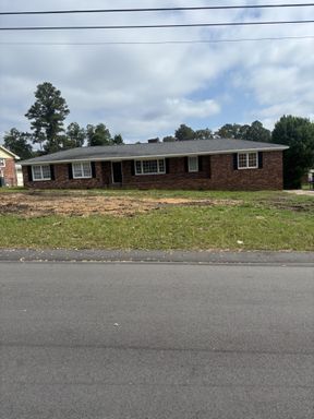 4bd 2ba All Brick Home with New Wood Floors & Large Fenced Yard – photo 1