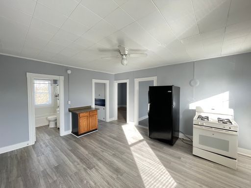 Three-Bedroom on Manchester's West Side with Private Porch and In-Unit Storage – photo 1