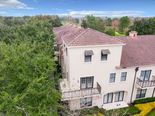 Iconic 2 story corner condo at the Terraces of Celebration. Completely renovated 2 Bedroom, 2 Bathroom with second floor Loft and wrap around balcony overlooking the Lake – photo 1