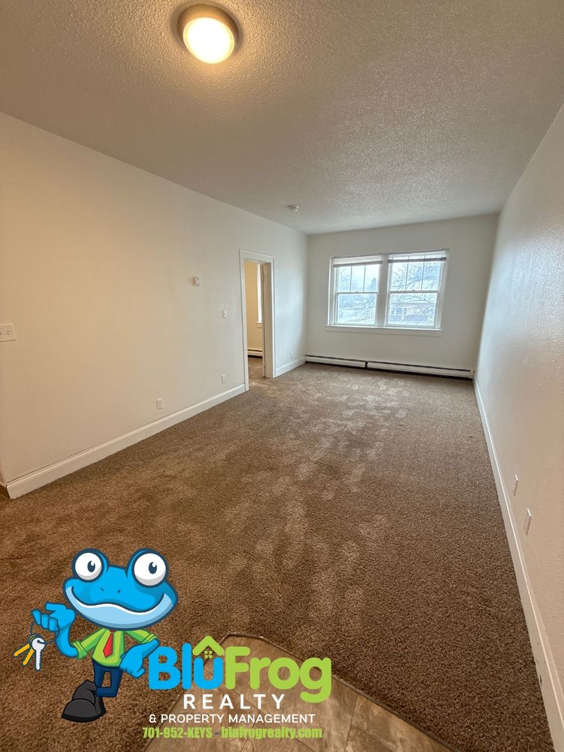 Jamestown Apartment: 402 2nd Ave NW - 203