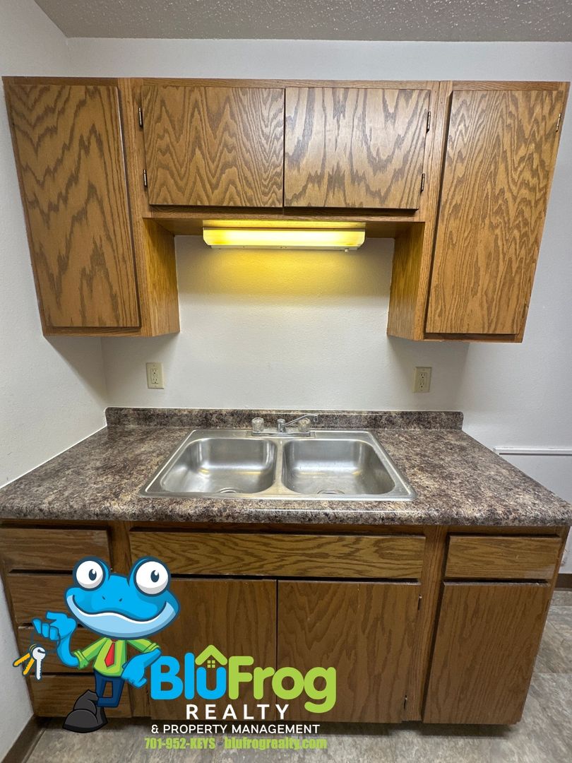 Jamestown Apartment: 402 2nd Ave NW - 306