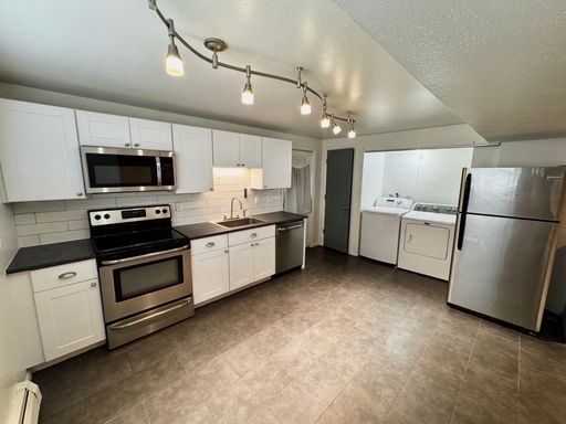 Golden Apartment with Stainless Steel Kitchen & Extra Storage
