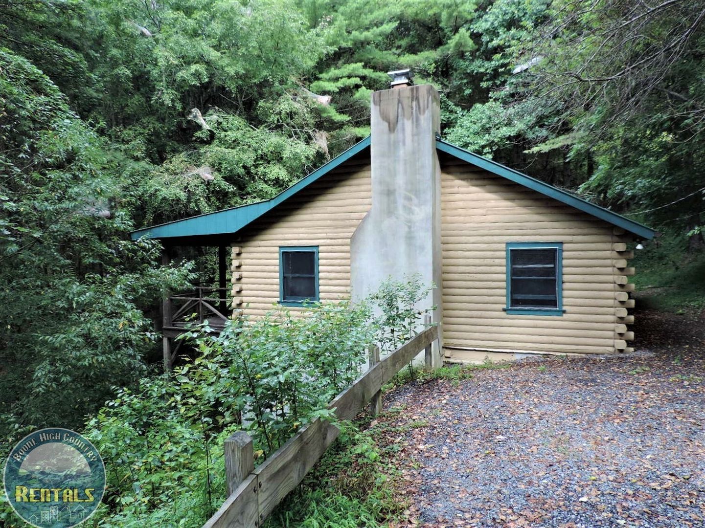 Cute Log Home Overlooking Wooded Area