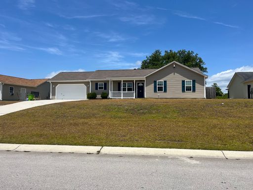 Great home avail in Hubert! Mini split AC in garage perfect for personal gym!