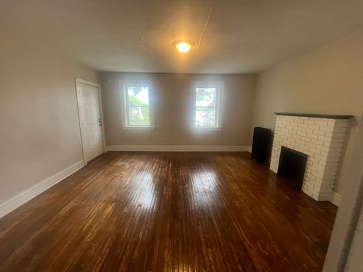1BD/ 1BA | Off-street Parking | Hardwood Floors | Laundry in basement | Decorative Fireplace