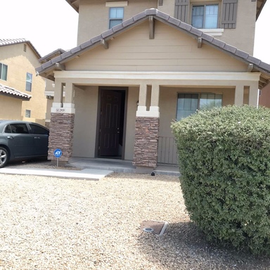 Front Porch Charm Meets Modern Living – Spacious 4-Bedroom Buckeye Beauty!