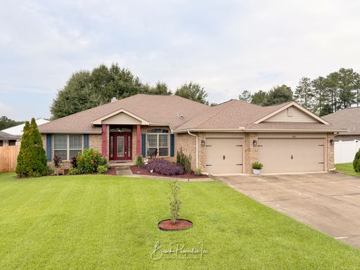 Spacious 4BR Pool Home with 3-Car Garage in Pace – photo 1