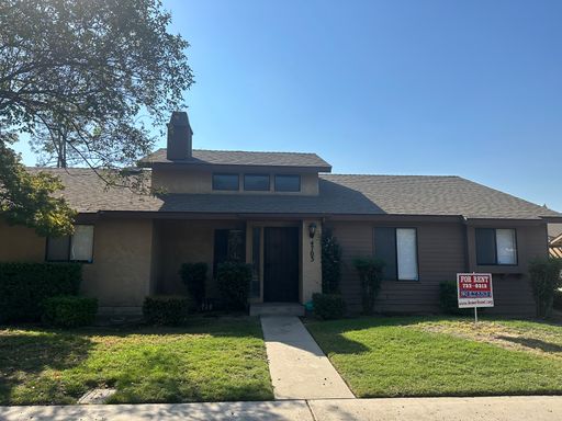Clean condo centrally located in Visalia with new flooring and paint!