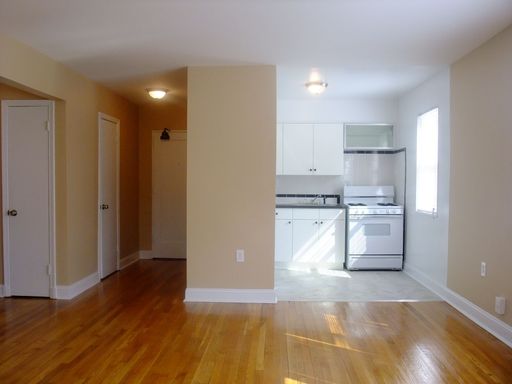 Super Sunny! Gorgeous 2 BR Apartment, Near Bus, Hardwood Floors! $35/mo Heating, Electric Meter for lights. Bring Your Pet!