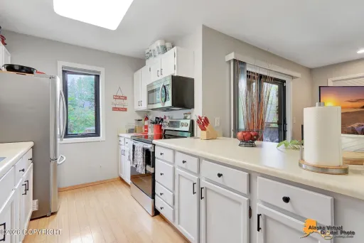 RARE FIND! Amazing 2 bed/2 bath Condo w/ in unit laundry + garage in highly requested neighborhood – photo 1