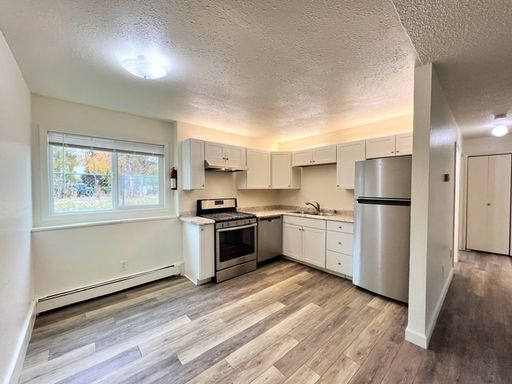 Updated Bottom Floor Two Bedroom - Quick Commute to JBER, UAA, and Hospitals – photo 1