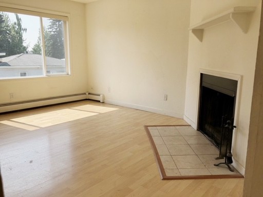 Nice and Bright Top Floor Two Bedroom with Laminate Flooring! – photo 1