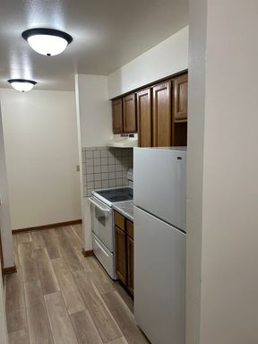 Spacious, quiet 2Bed/2bath Third floor corner unit facing courtyard on W Main St, Waunakee