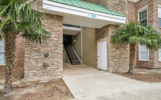 Don't miss this 4-bed, 3-bath condo TWO miles from the ocean!