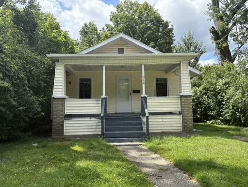 Charming 3-Bedroom Akron Home with a Covered Porch and Private Yard – photo 1