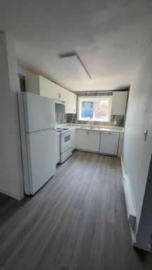 Updated 2 Bedroom 1.5 Bath Laundry On Site