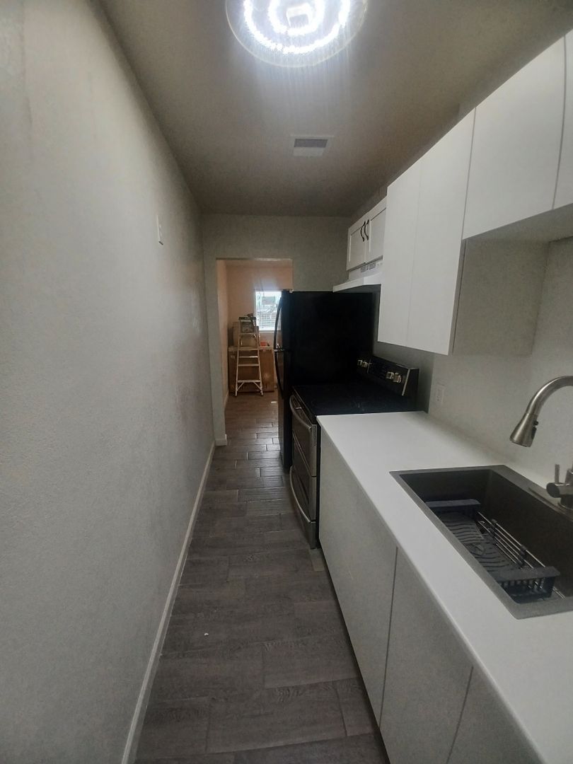 Apartment kitchen — apartment 1 at Madison Apartments.