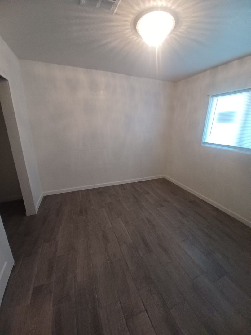 Unfurnished bedroom — apartment 1 at Madison Apartments.