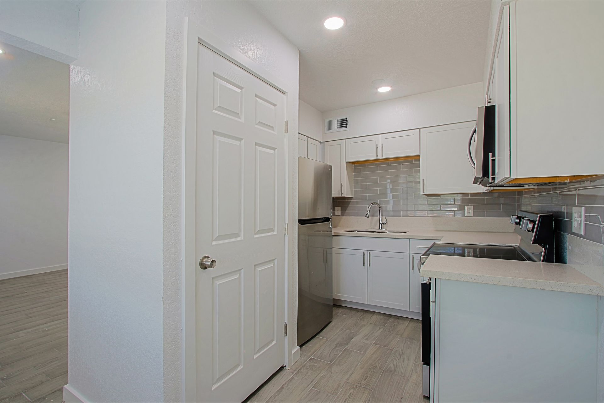 Apartment kitchen — representative home at Urbana at Arcadia.