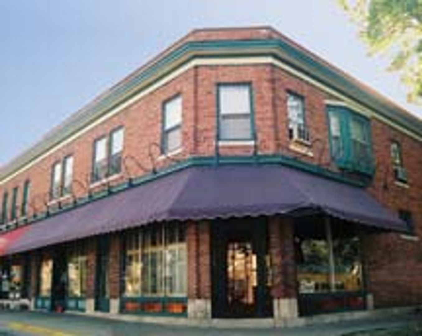 Madison Apartment: 1201-1203 Williamson Street, 405 S. Few St.