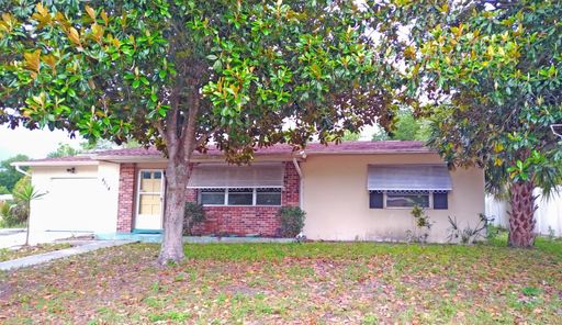 Spacious 2/2 home featuring neutral ceramic tile throughout within the heart of Spring Hill – photo 1