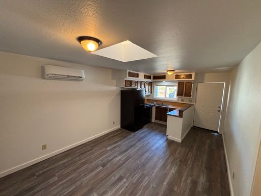 This cute 2 bedroom 2 bathroom duplex was recently updated with newer floors, paint and appliances! – photo 1