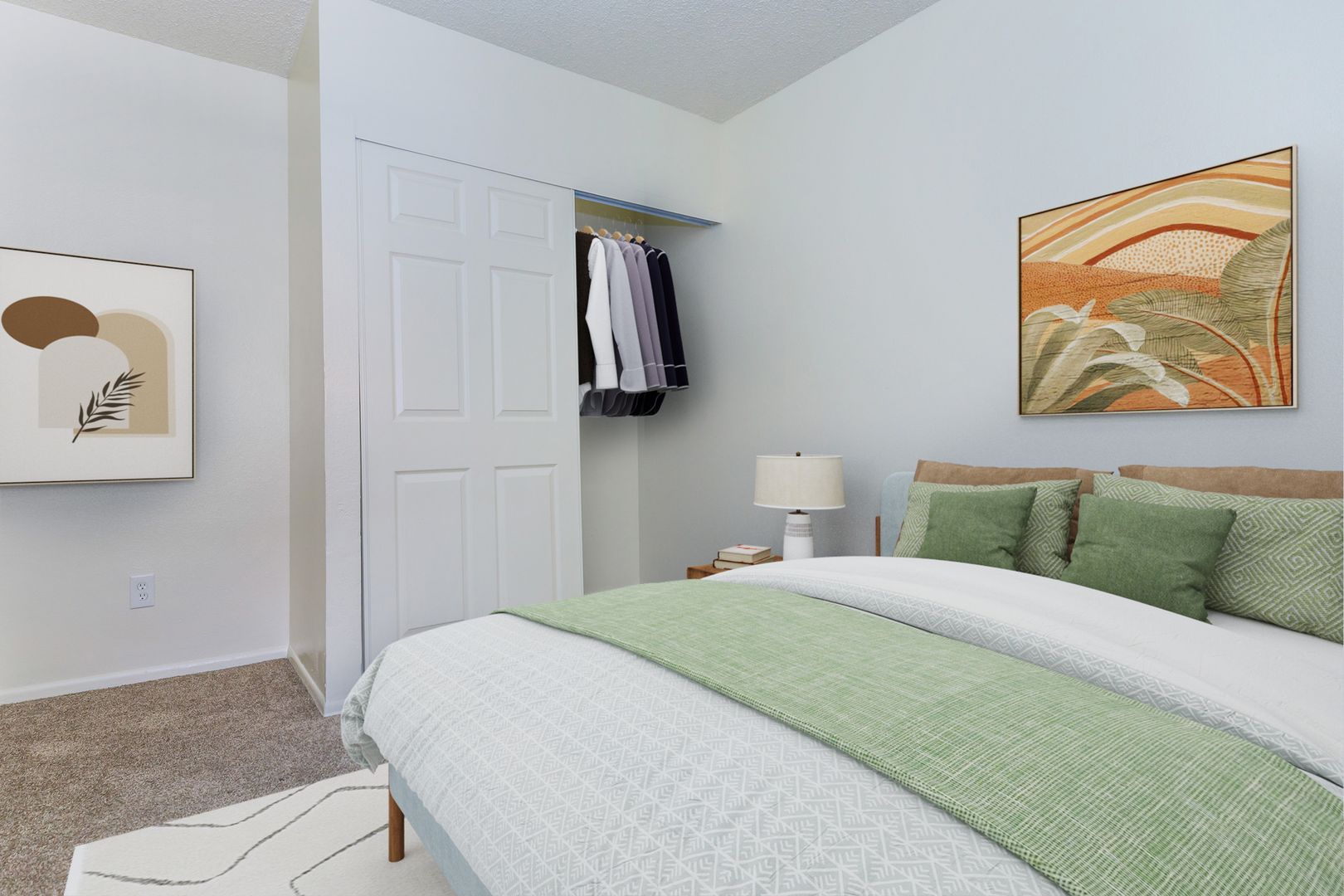 Furnished bedroom shown — representative home at Lynnwood Apartments.