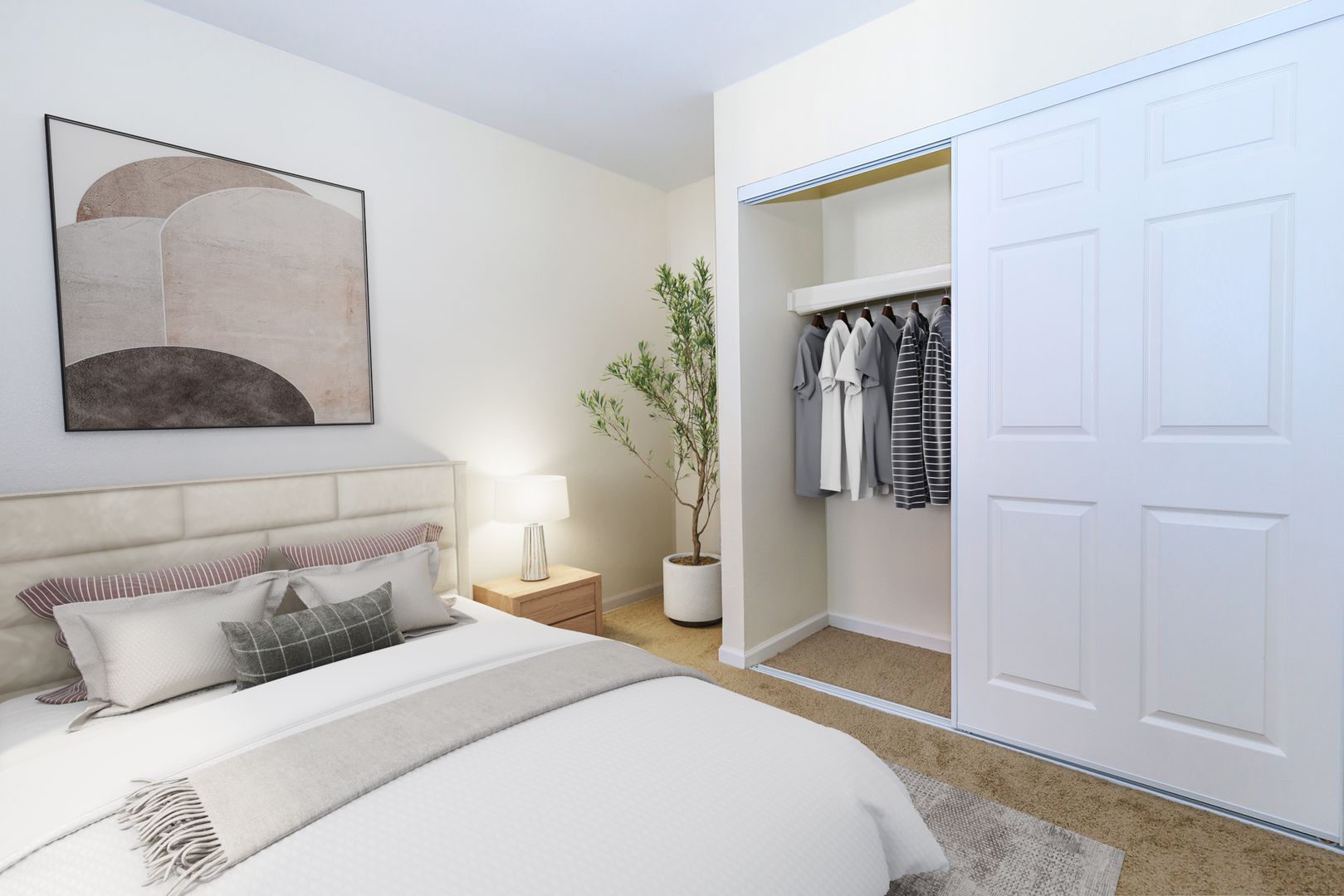 Furnished bedroom shown — representative home at Lynnwood Apartments.