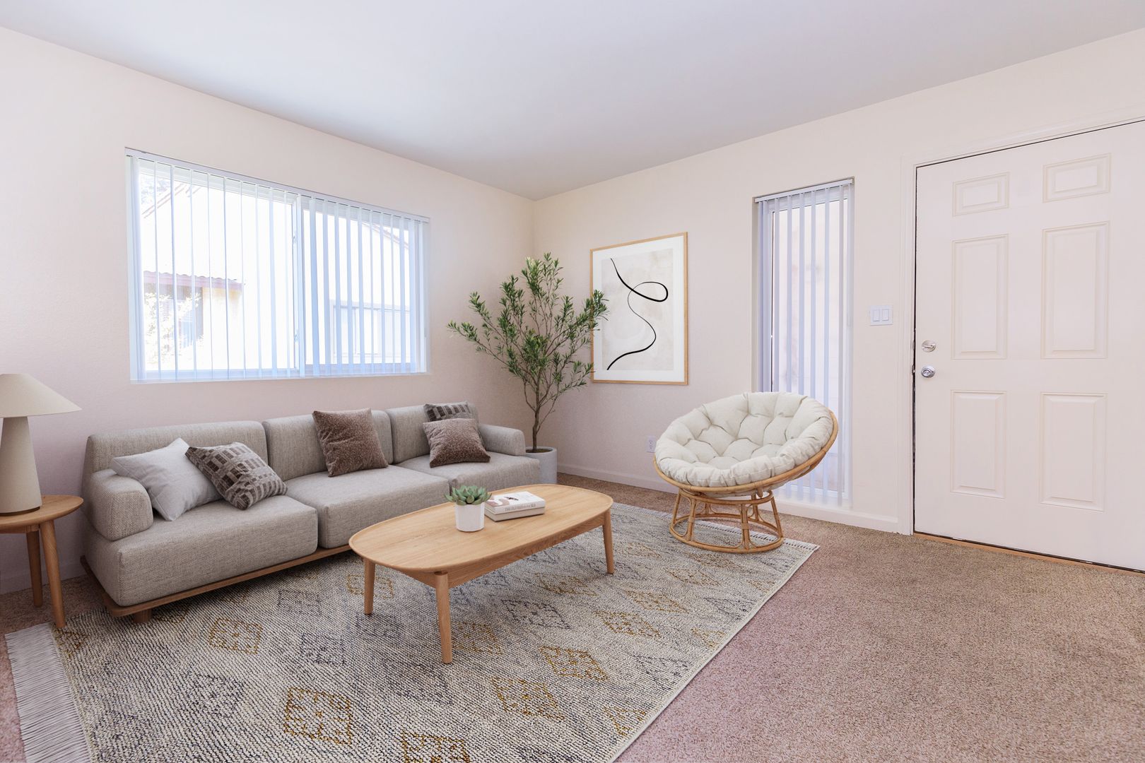 Furnished apartment living area shown — representative home at Lynnwood Apartments.