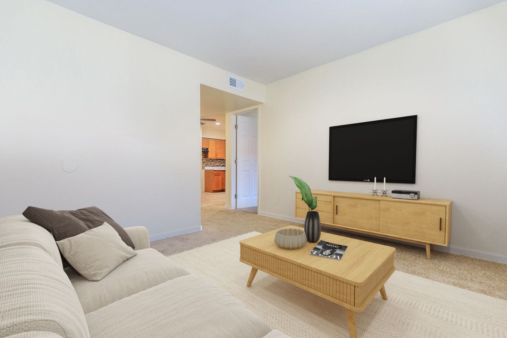 Furnished apartment living area shown — representative home at Lynnwood Apartments.