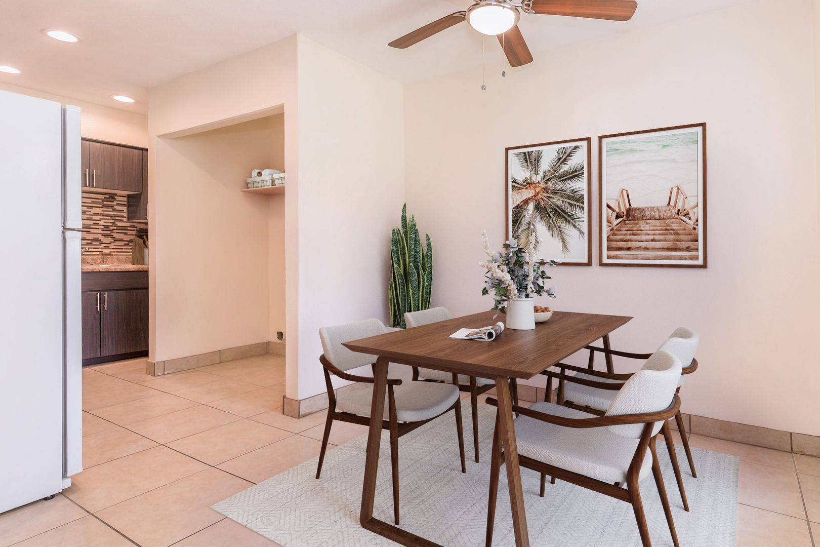 Furnished dining area shown — representative home at Lynnwood Apartments.