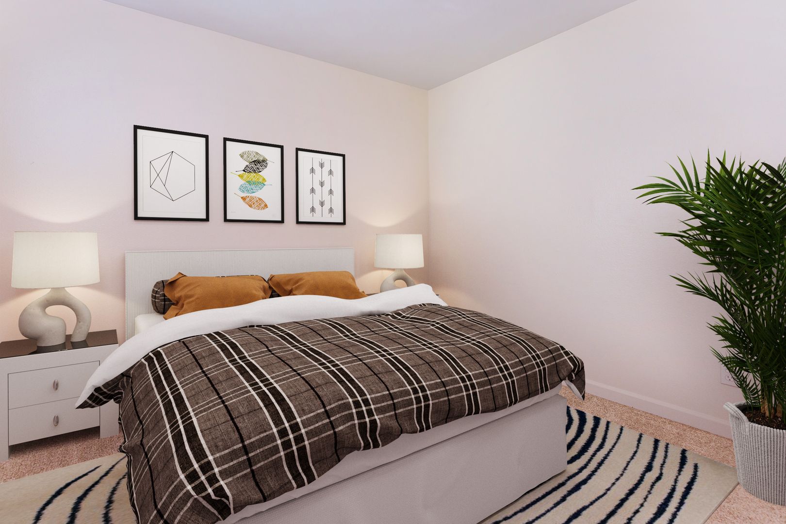 Furnished bedroom shown — representative home at Lynnwood Apartments.