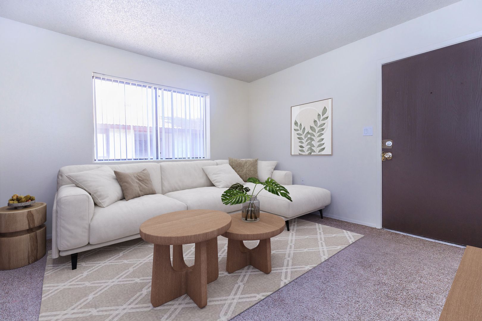 Furnished apartment living area shown — representative home at Lynnwood Apartments.