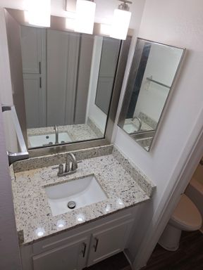 A1 — 1 Bed / 1 Bath • 702 SF – photo 1