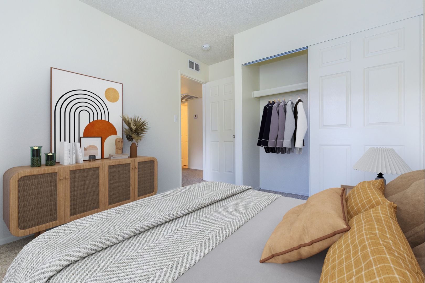 Furnished bedroom shown — representative home at Lynnwood Apartments.