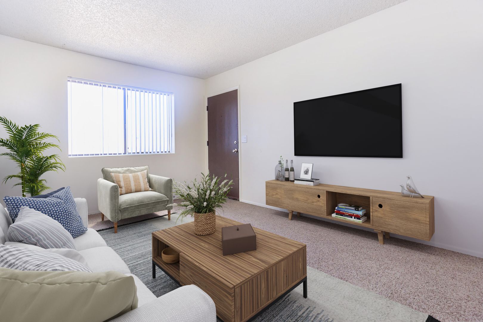 Furnished apartment living area shown — representative home at Lynnwood Apartments.