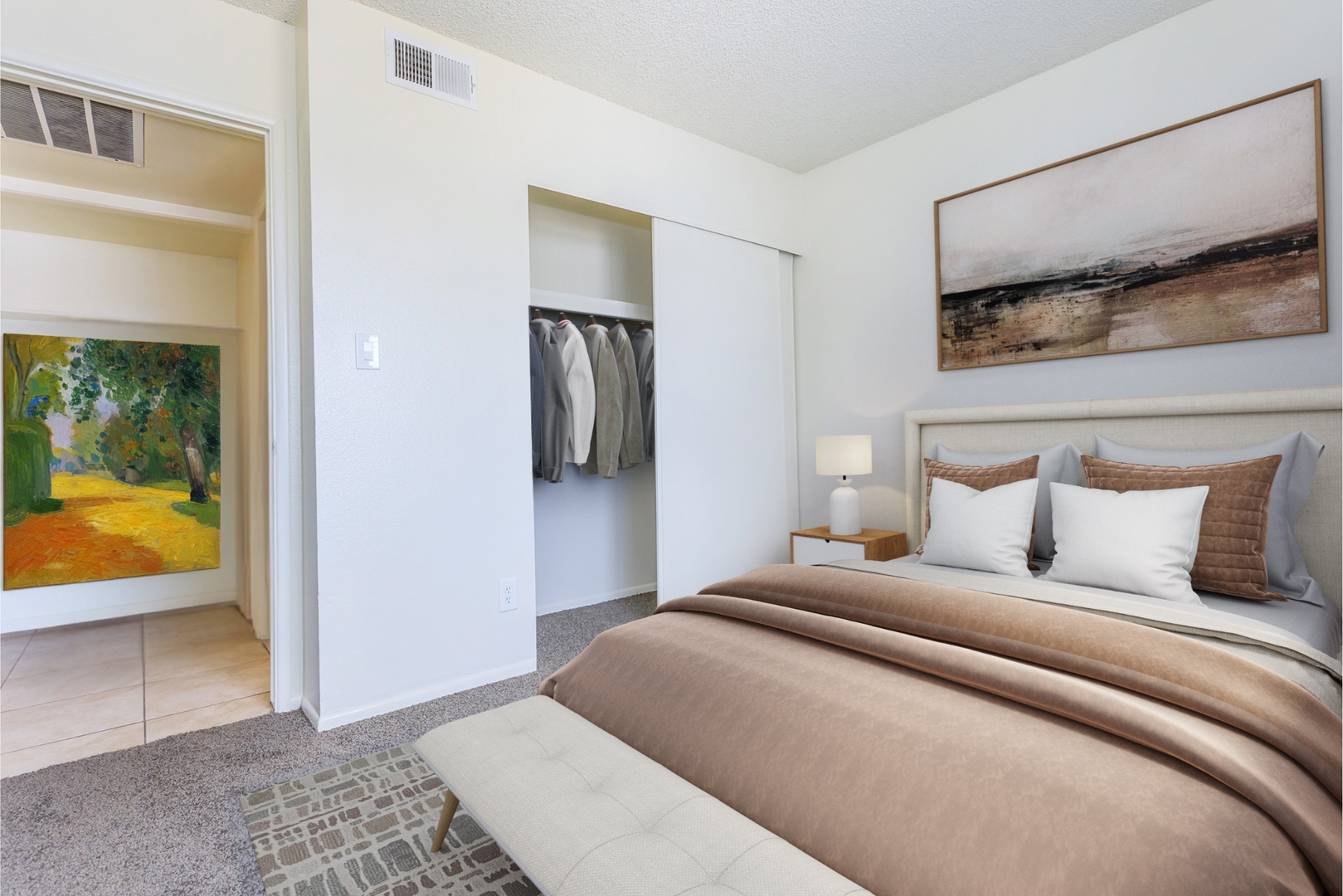 Furnished bedroom shown — representative home at Lynnwood Apartments.