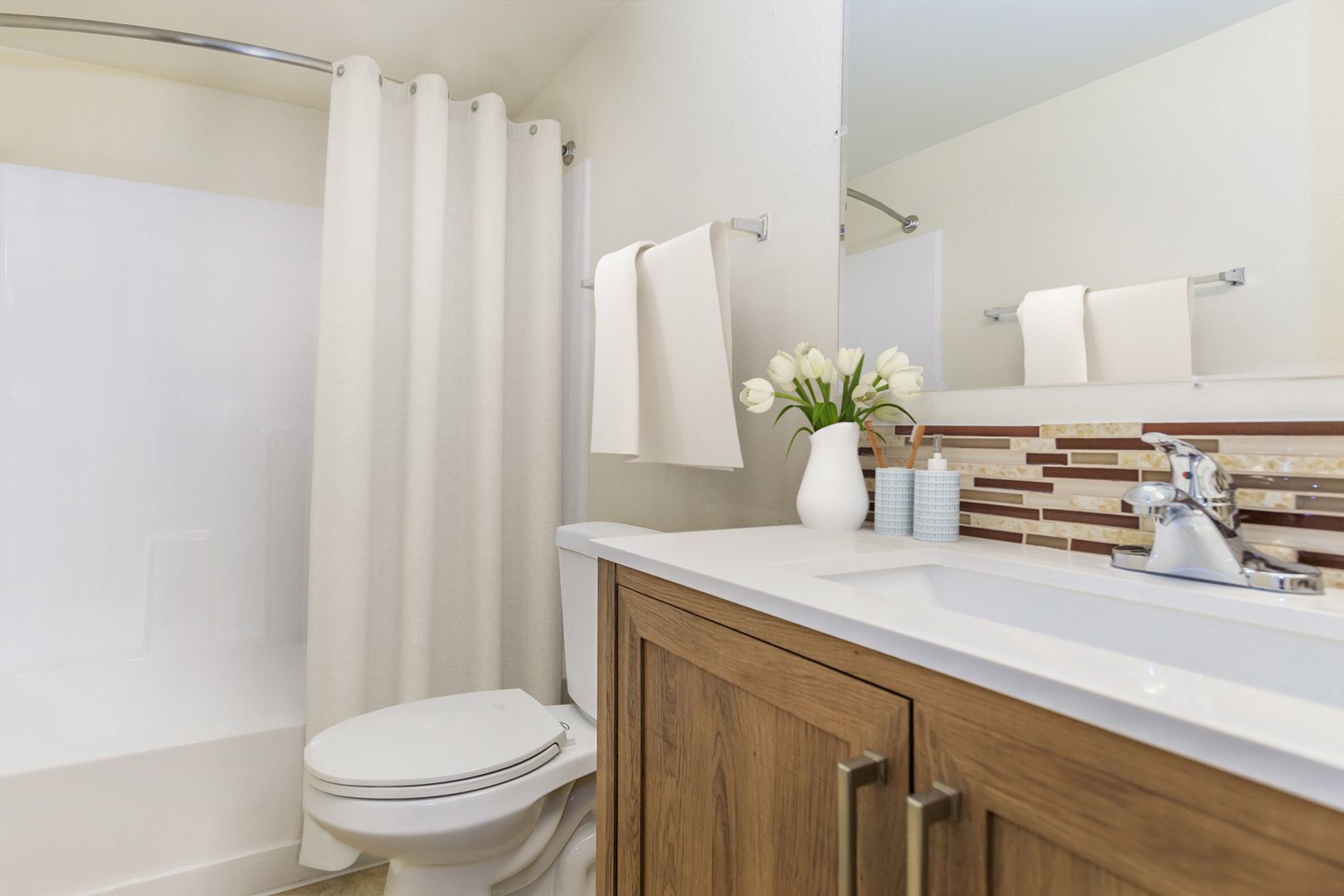 Apartment bathroom — representative home at Lynnwood Apartments.