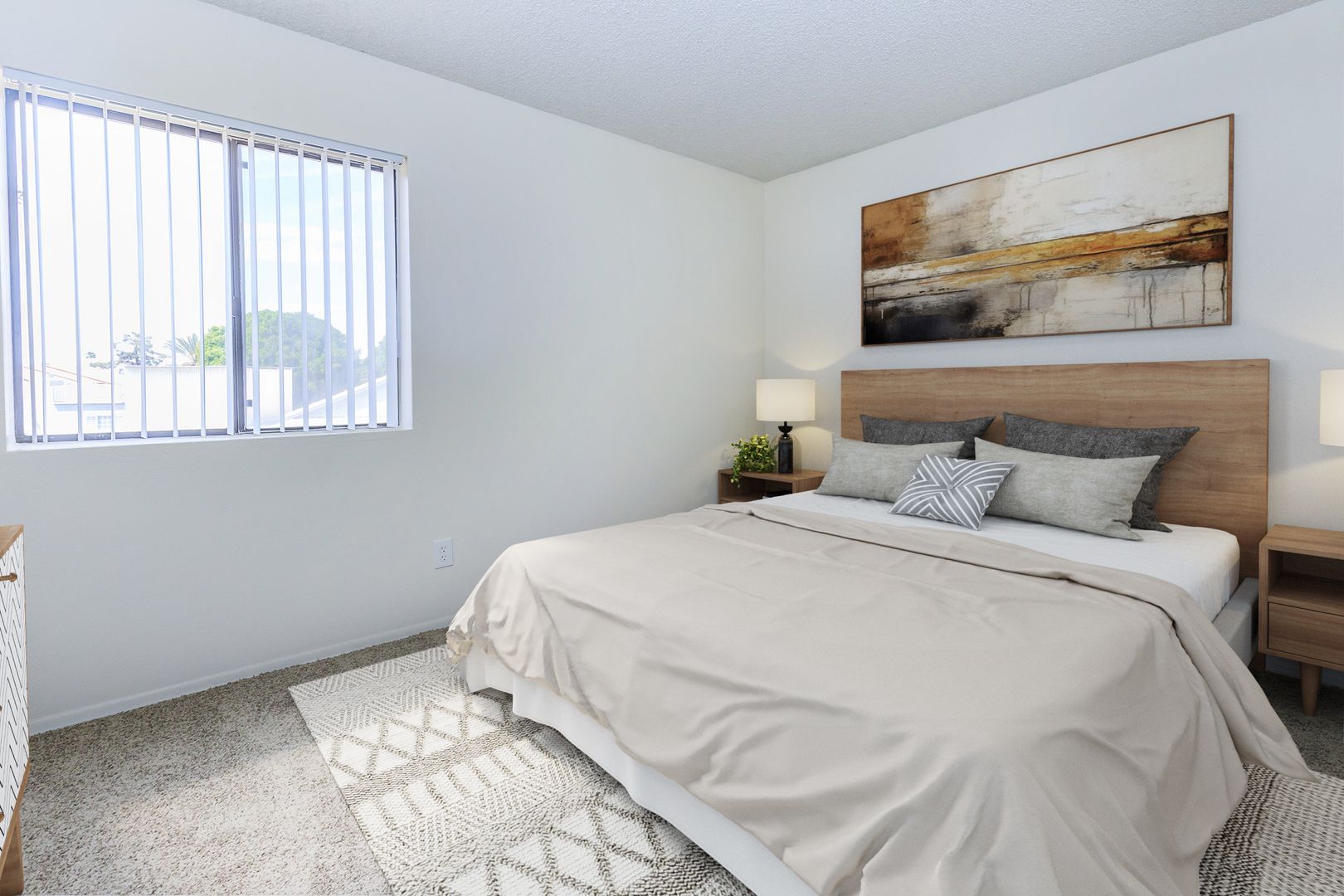Furnished bedroom shown — representative home at Lynnwood Apartments.