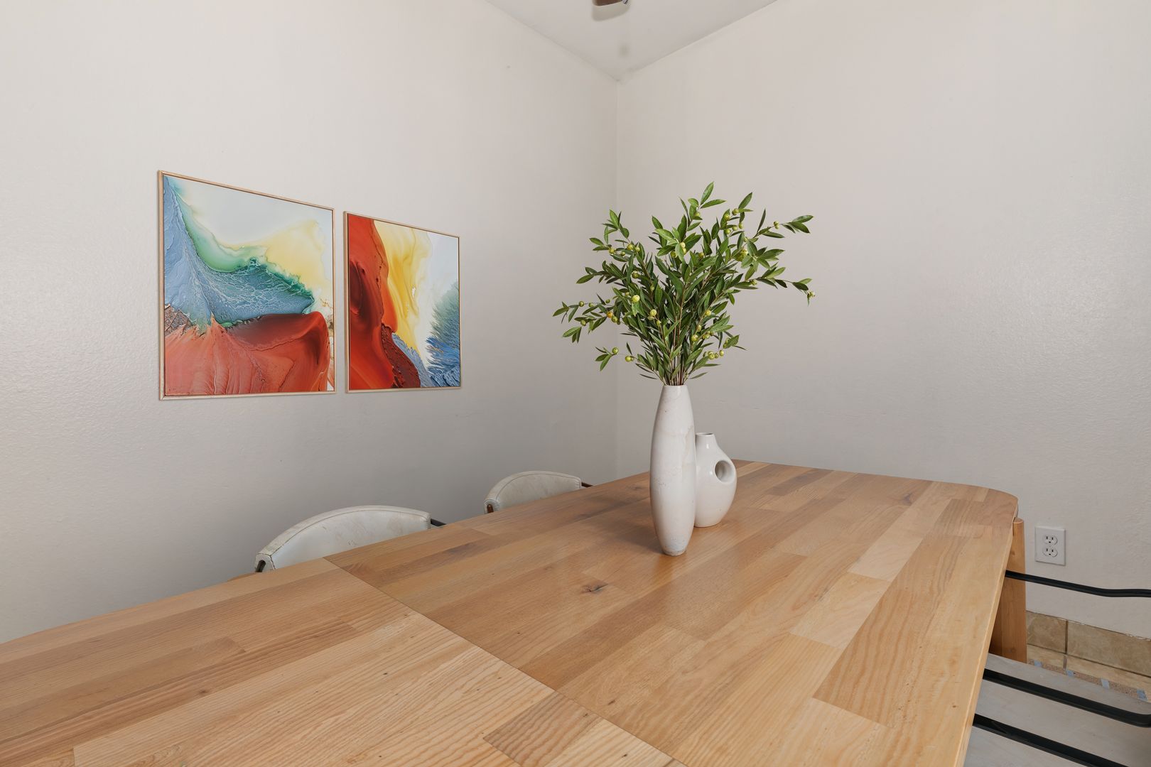 Furnished dining area shown — representative home at Lynnwood Apartments.
