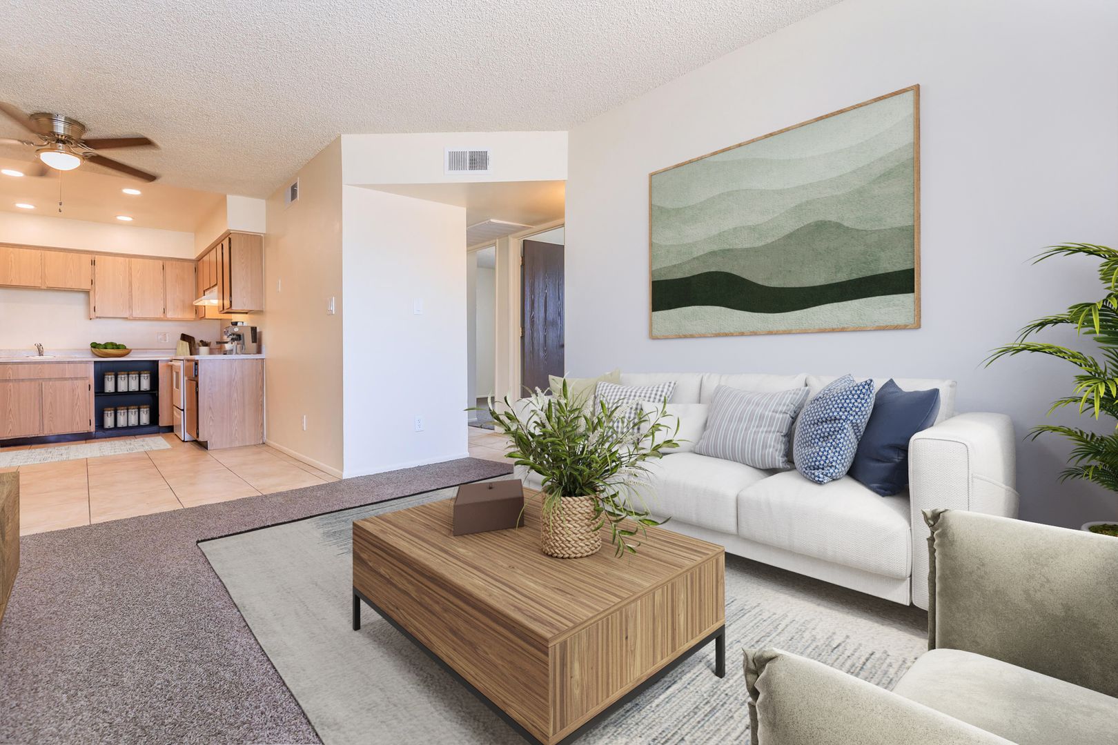 Furnished apartment living area shown — representative home at Lynnwood Apartments.