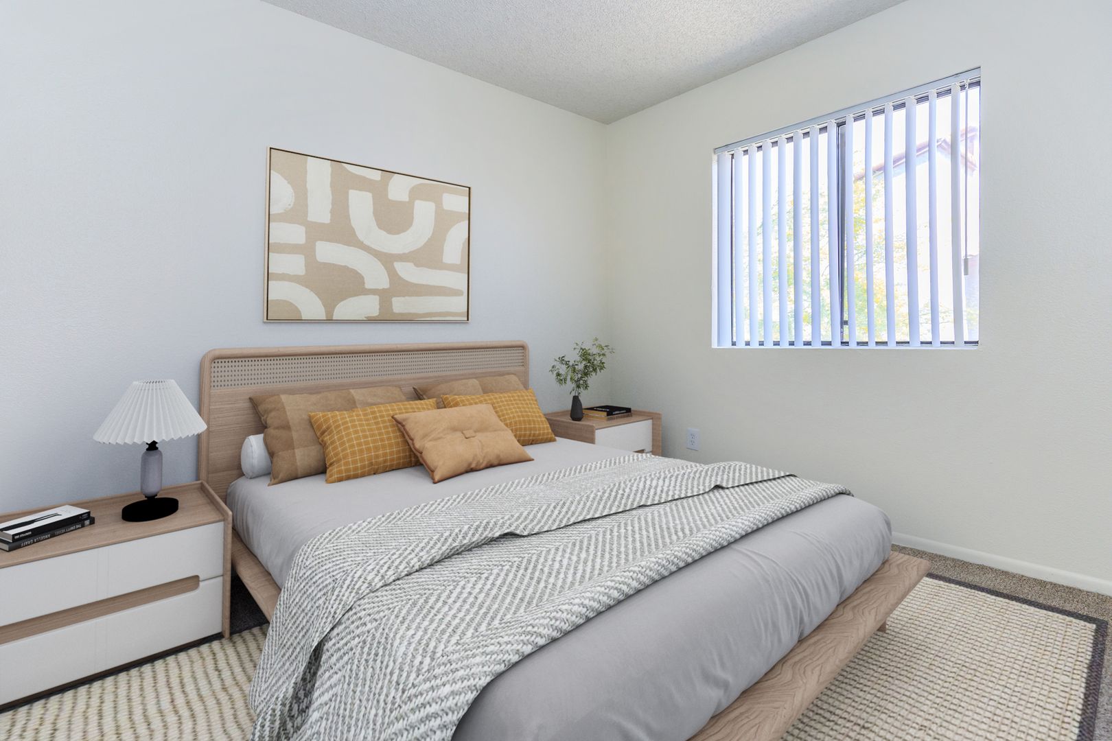 Furnished bedroom shown — representative home at Lynnwood Apartments.