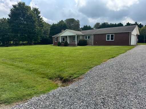 Country Setting but close enough Single Family Home
